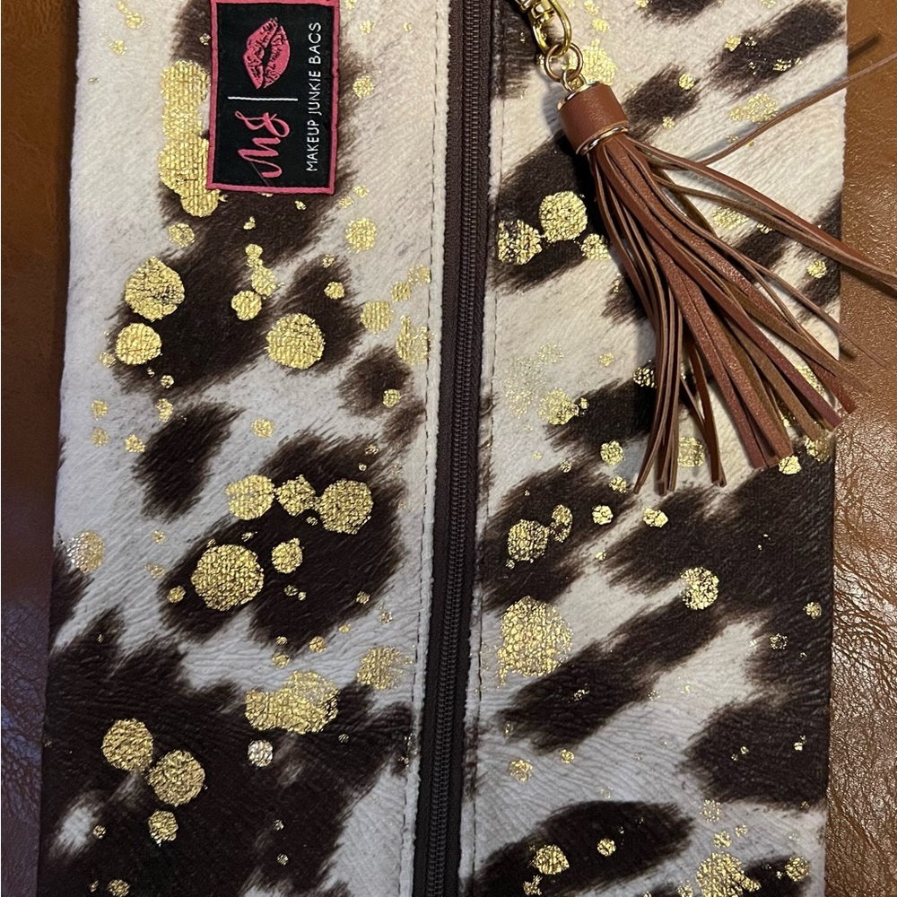 Gold and Brown Cosmetic Case with Leather Tassel
